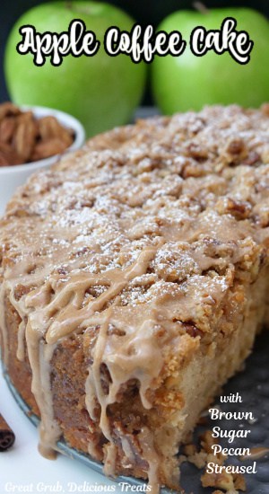 An apple coffee cake with green apples and pecans in the background.