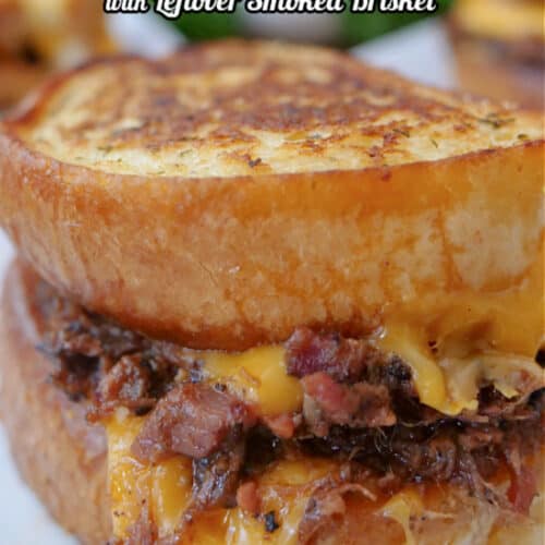 A grilled cheese sandwich made with garlic Texas toast and stuffed with chopped brisket and cheddar cheese.