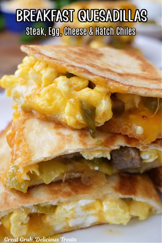A stack of breakfast quesadillas on a white plate.