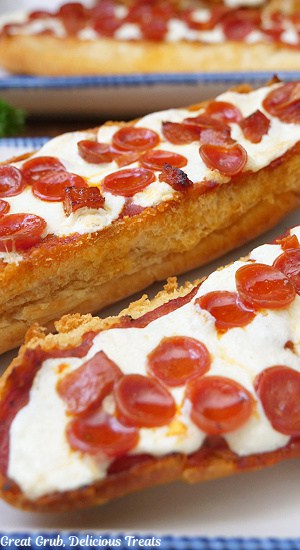 Pepperoni Pizza bread on a white plate.
