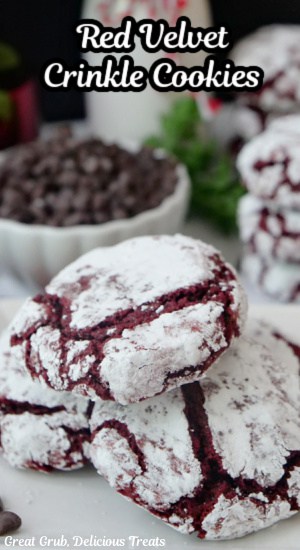 A stack of crinkle cookies on a white plate.