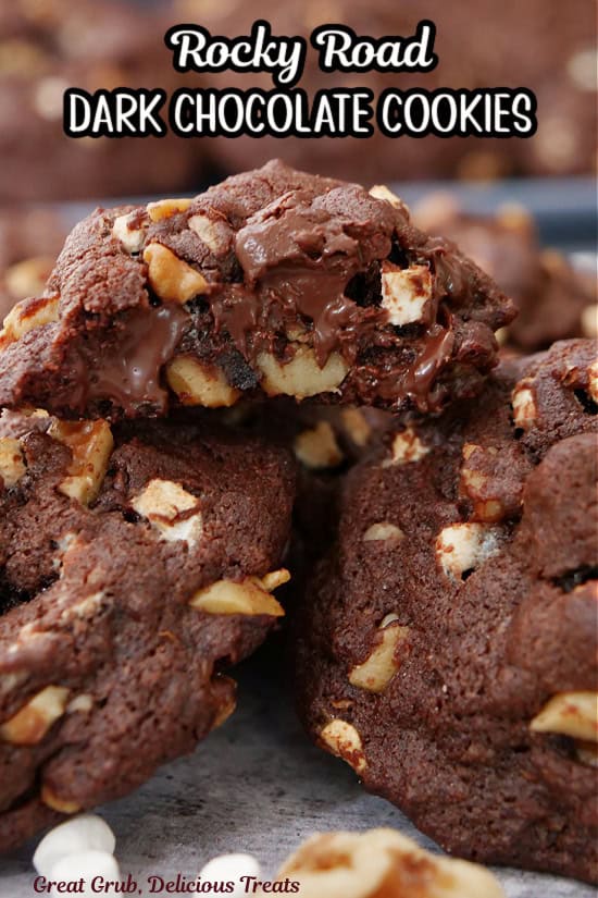 A stack of rocky road dark chocolate cookies on a white surface with the title in text at the top.