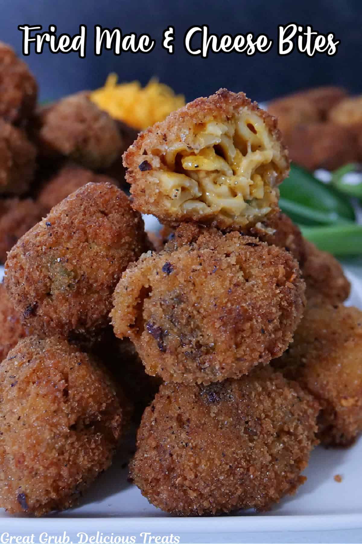 A stack of deep fried mac and cheese bites on a white plate with the title overlay at the top.