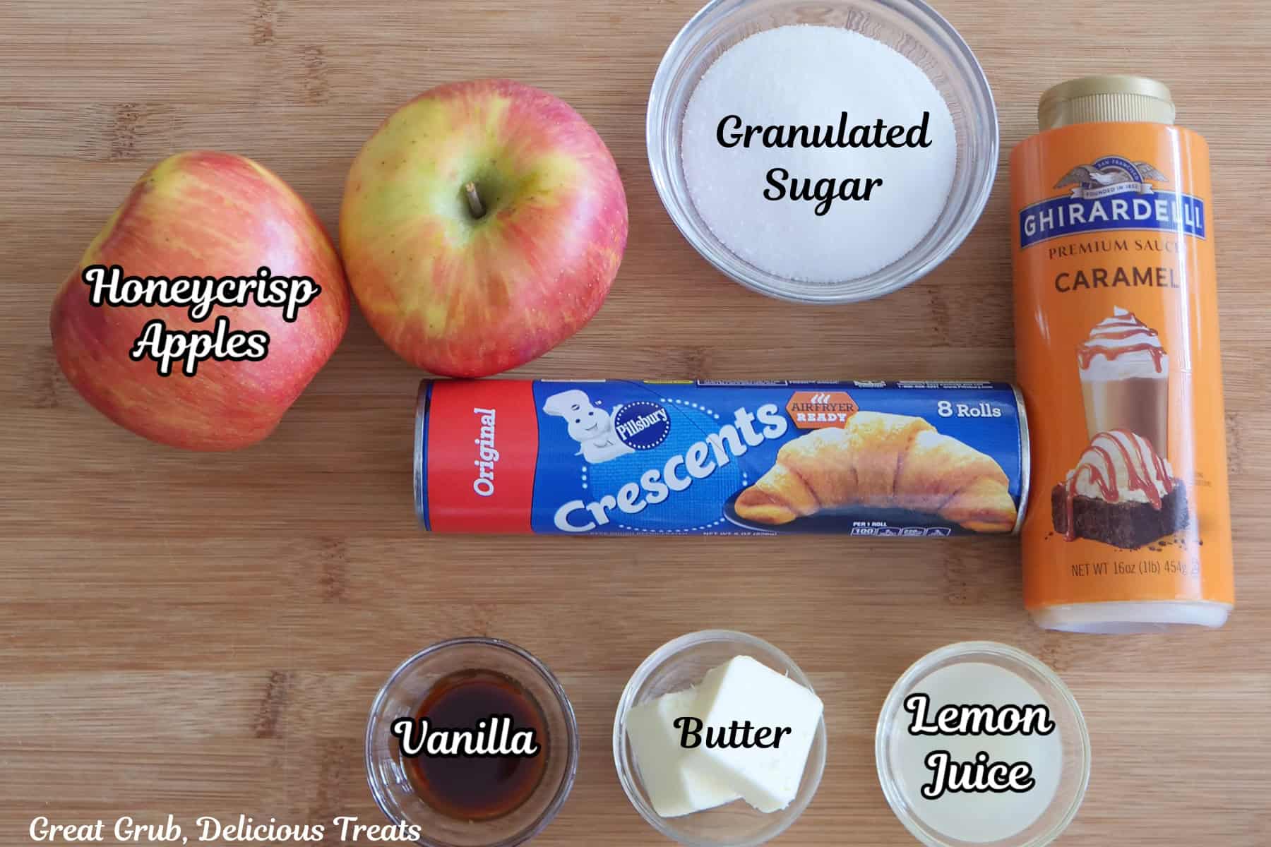 A wood surface with all the ingredients on it to make caramel apple roses with sea salt.