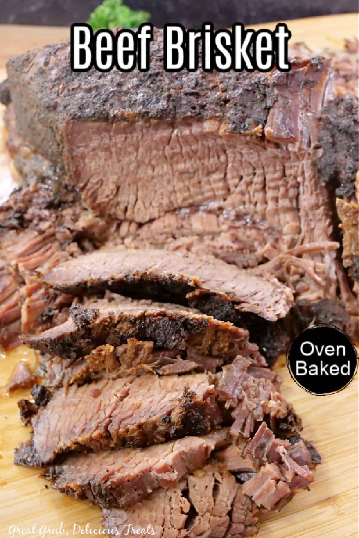 A wood surface with a beef brisket on it with a few sliced pieces placed in front, and a title overlay at the top.