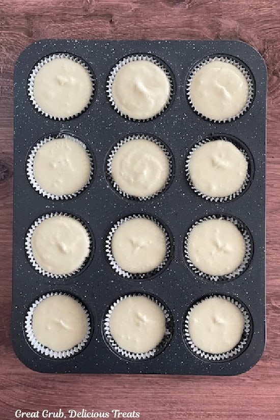 A 12-count muffin tin with cheesecake batter added over the chocolate crunch crust.
