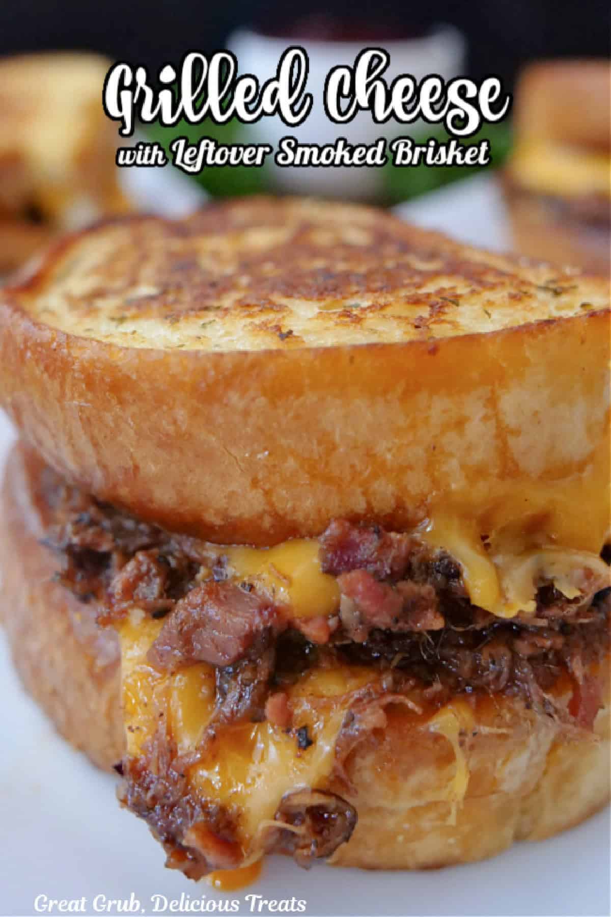 A grilled cheese sandwich filled with leftover beef brisket and sharp cheddar cheese with a title overlay at the top.
