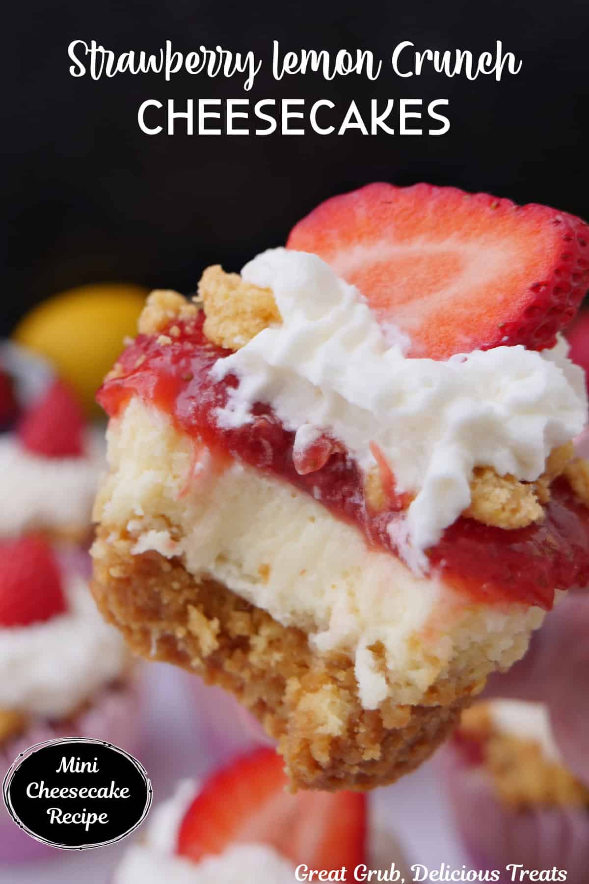 A mini strawberry lemon crunch cheesecake held up with a bite taken out of it, and a title overlay at the top.