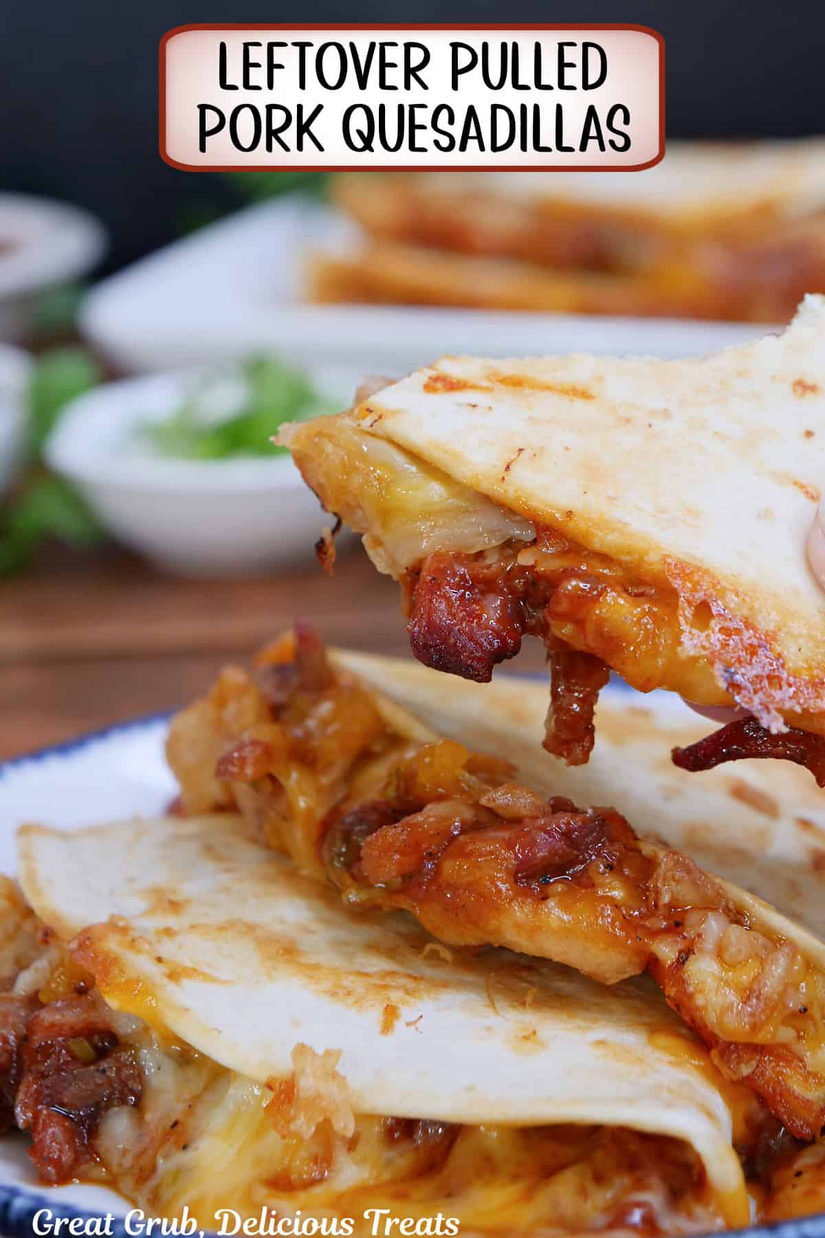 A white plate with a stack of three slices of pulled pork quesadillas on it, with a title overlay at the top.