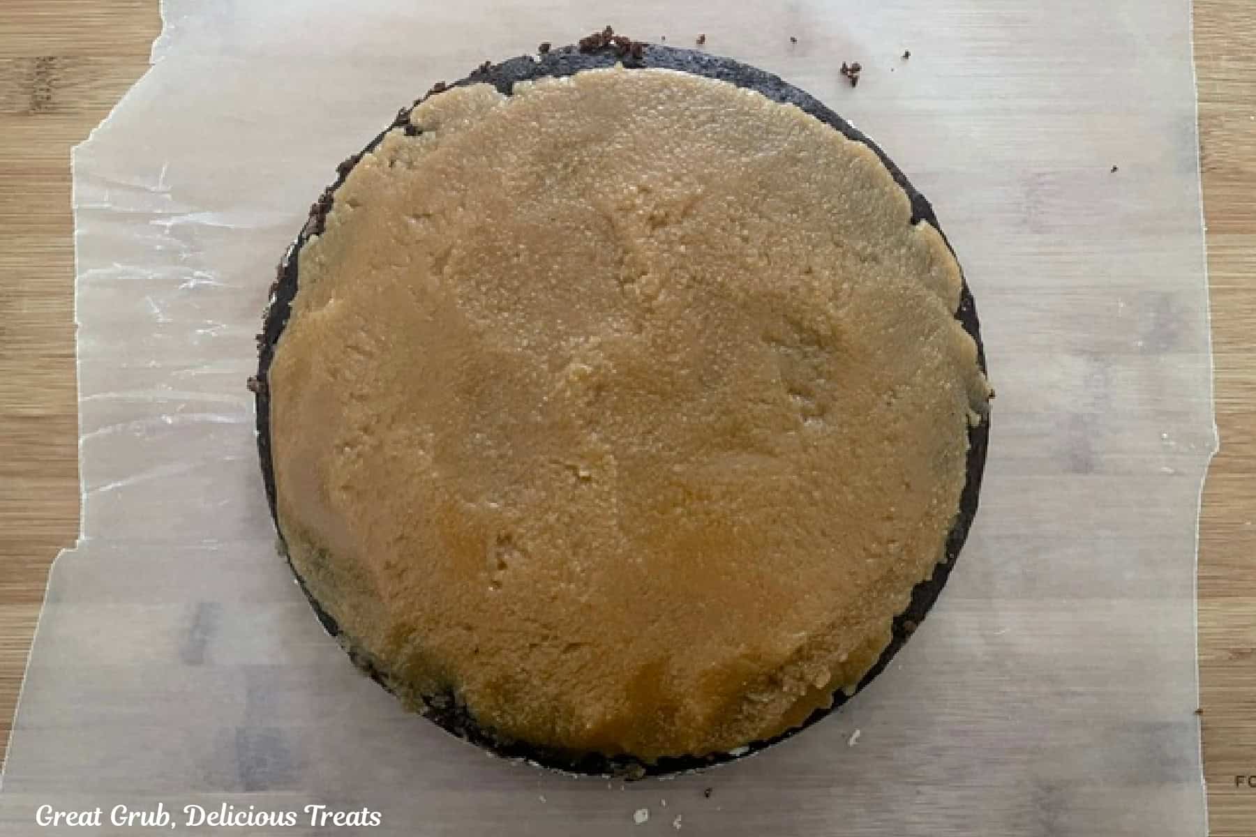 A round chocolate cake layered with homemade caramel filling.