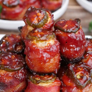 A white plate with a stack of smoked meatball pig shots on it with a title overlay at the top.