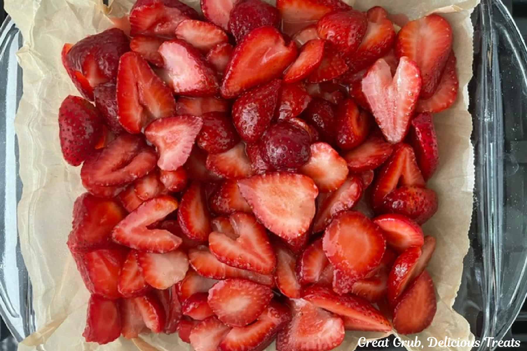A fresh strawberry filling placed on top of the baking bottom pie crust.