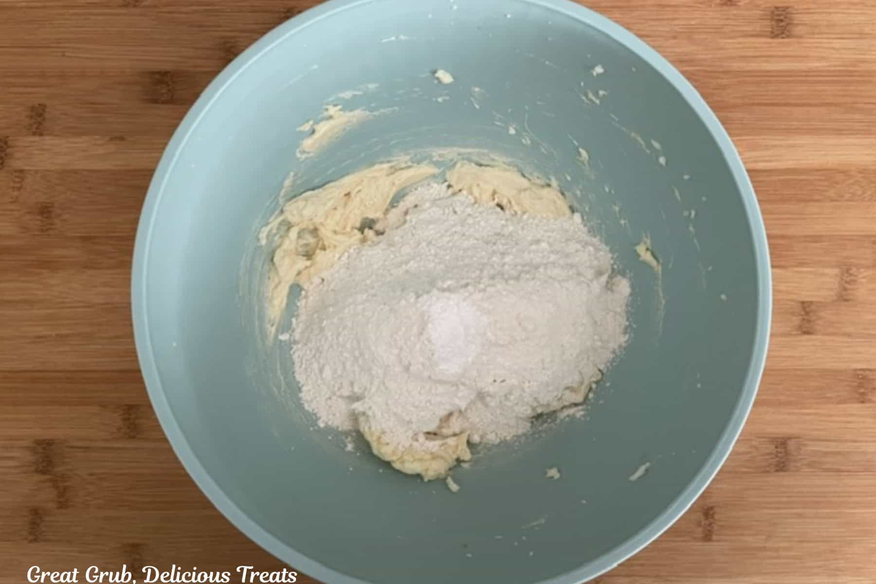 All purpose flour added with the wet suage cookie ingredients.