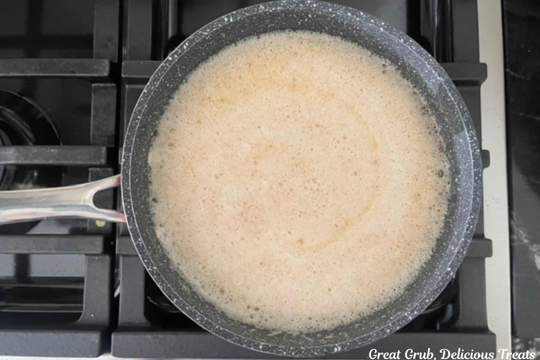 A saucepan with butter browning in the pan.