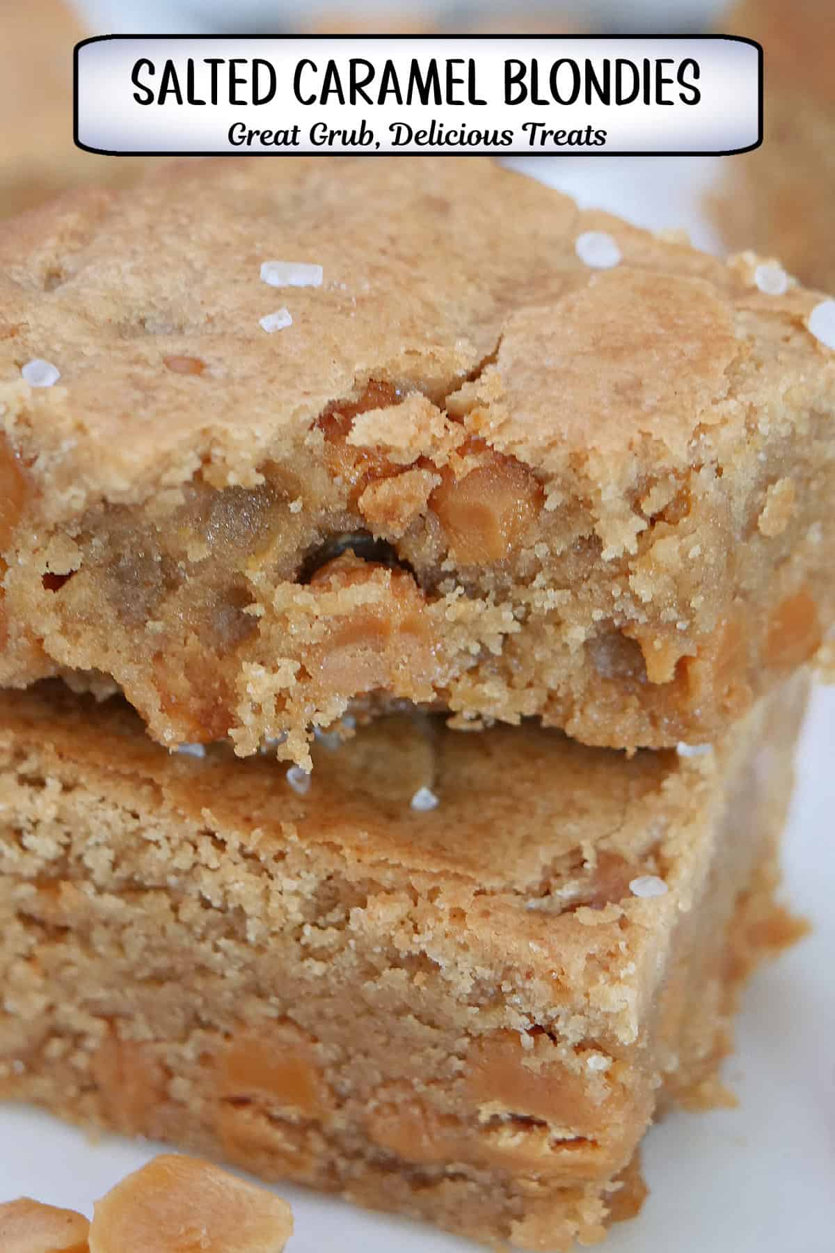 A white plate with two salted caramel blondies on it with a bite taken out of the blondie on top, and a title overlay at the top.