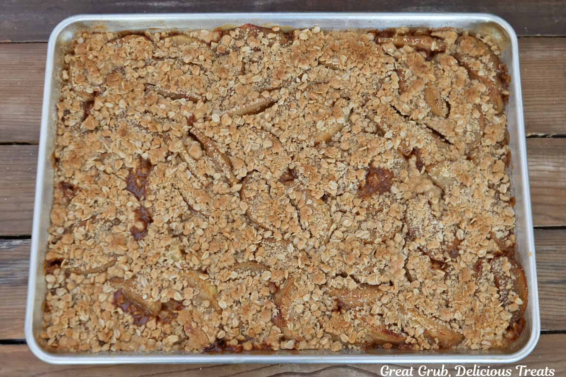 A sheet pan caramel apple crisp after being baked.