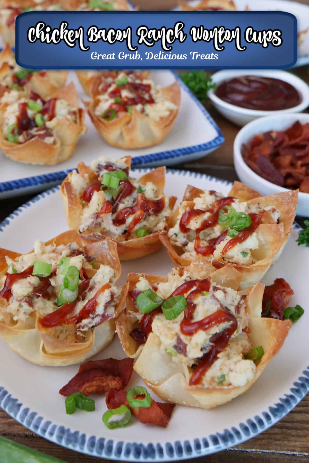 A white plate with blue trim with four chicken bacon ranch wonton cups on it with more in the background, and a title overlay at the top.