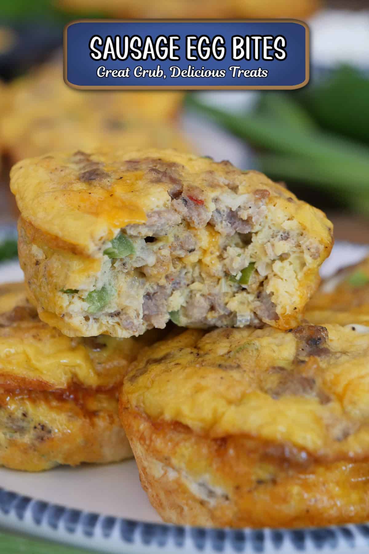 A stack of sausage egg bites on a white plate with blue trim with a bite taken out of the egg bite on top, and a title overlay at the top.